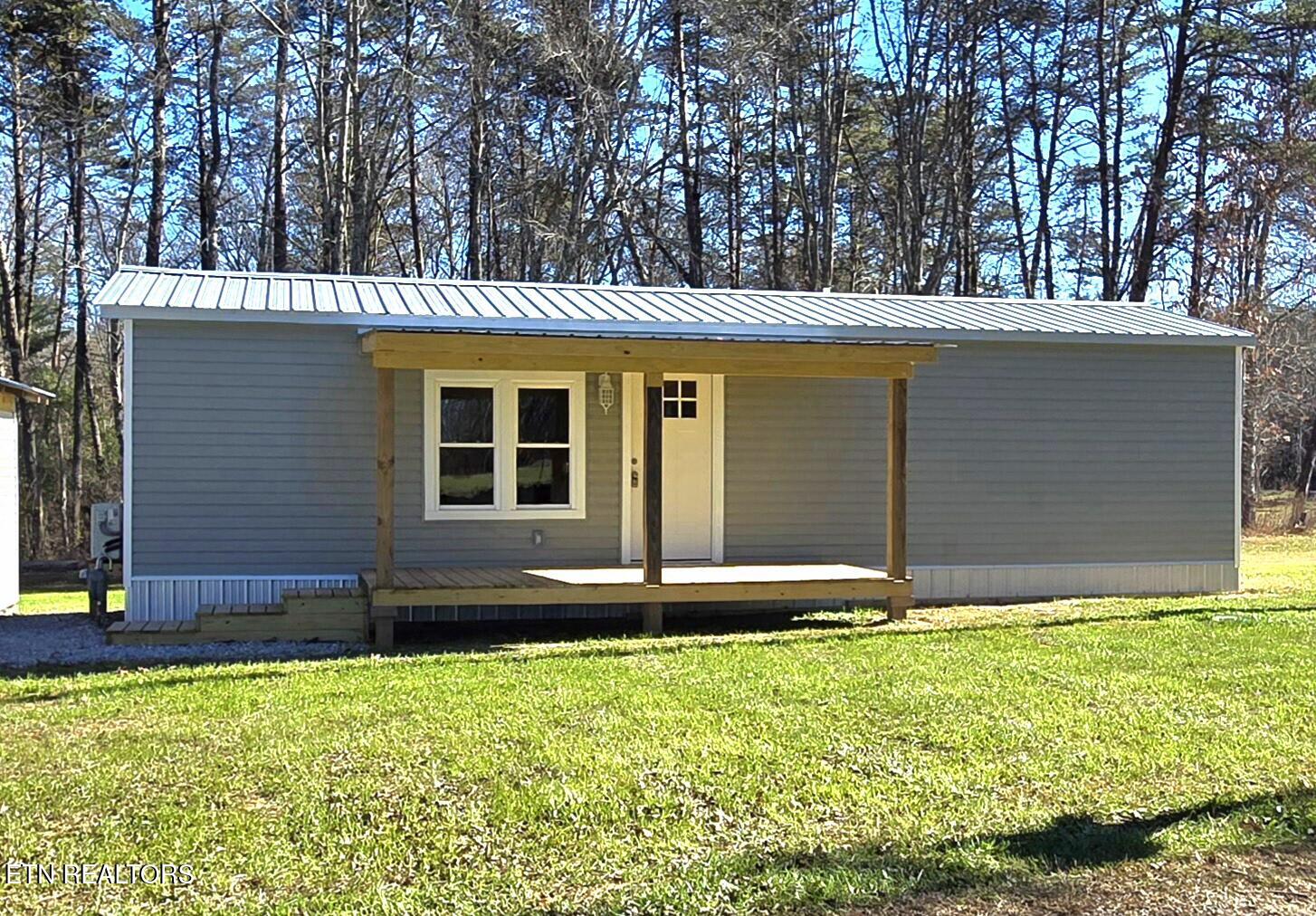 910 Barnett Bridge Road Lancing, TN 37770 - Photo 2 of 20 910 Barnett Bridge Roaf