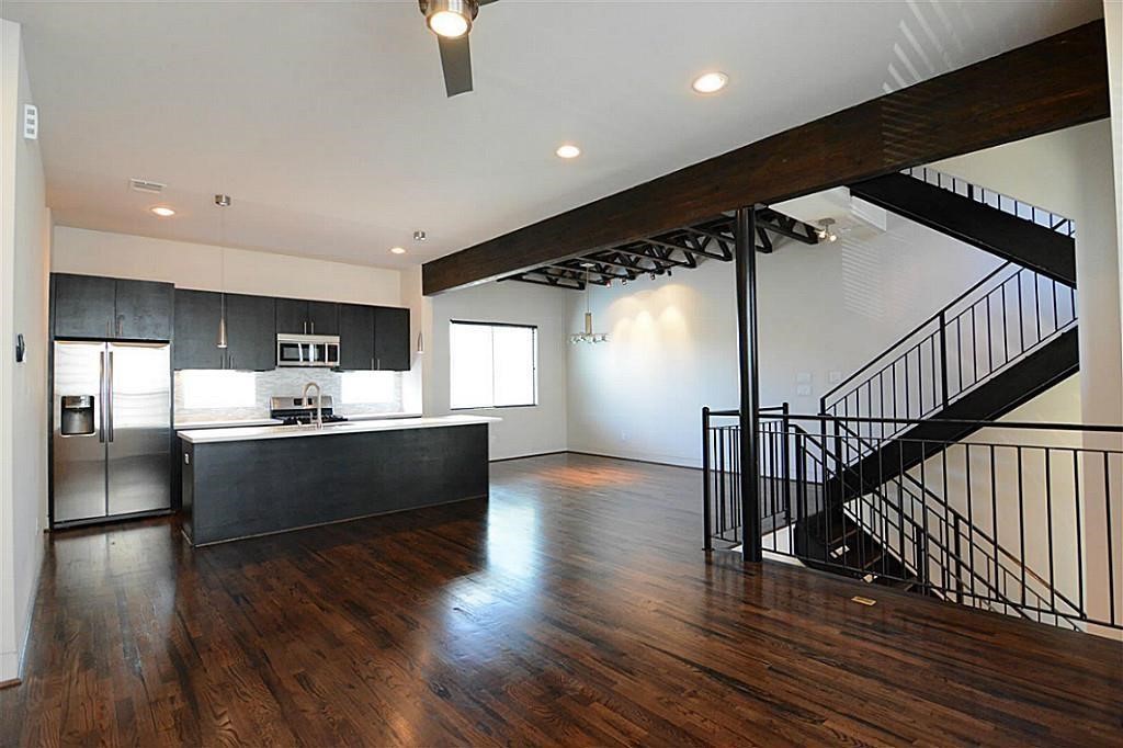 4708 Crawford Street Houston, TX 77004 - Photo 8 of 21 2nd floor- wide angle view to showcase family area, kitchen and dining place