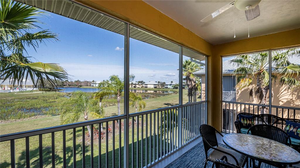 Welcome home to 25595 Heritage Lake Blvd and enjoy a birds' eye view of the nesting bird sanctuary from your private balcony lanai!