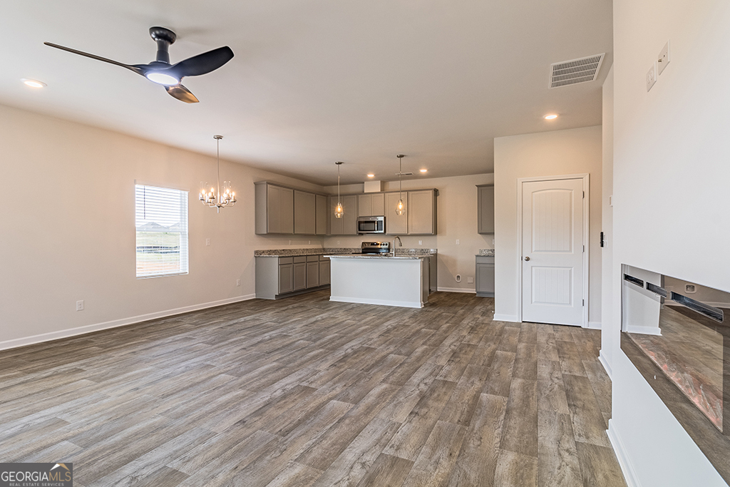 211 Agriculture Lane, Unit 9 Perry, GA 31069 - Photo 14 of 48 a view of kitchen with sink microwave and refrigerator