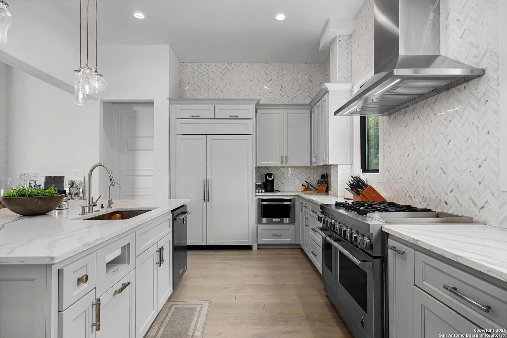 140 Rio Azul Seguin, TX 78155 - Photo 11 of 34 a kitchen with stainless steel appliances granite countertop a sink stove and cabinets