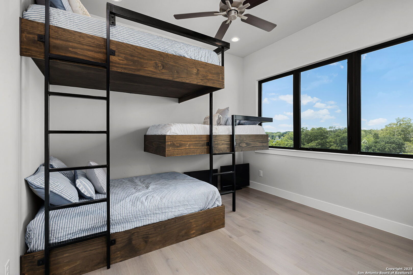 140 Rio Azul Seguin, TX 78155 - Photo 22 of 34 a bedroom with a bed a window and walk in closet