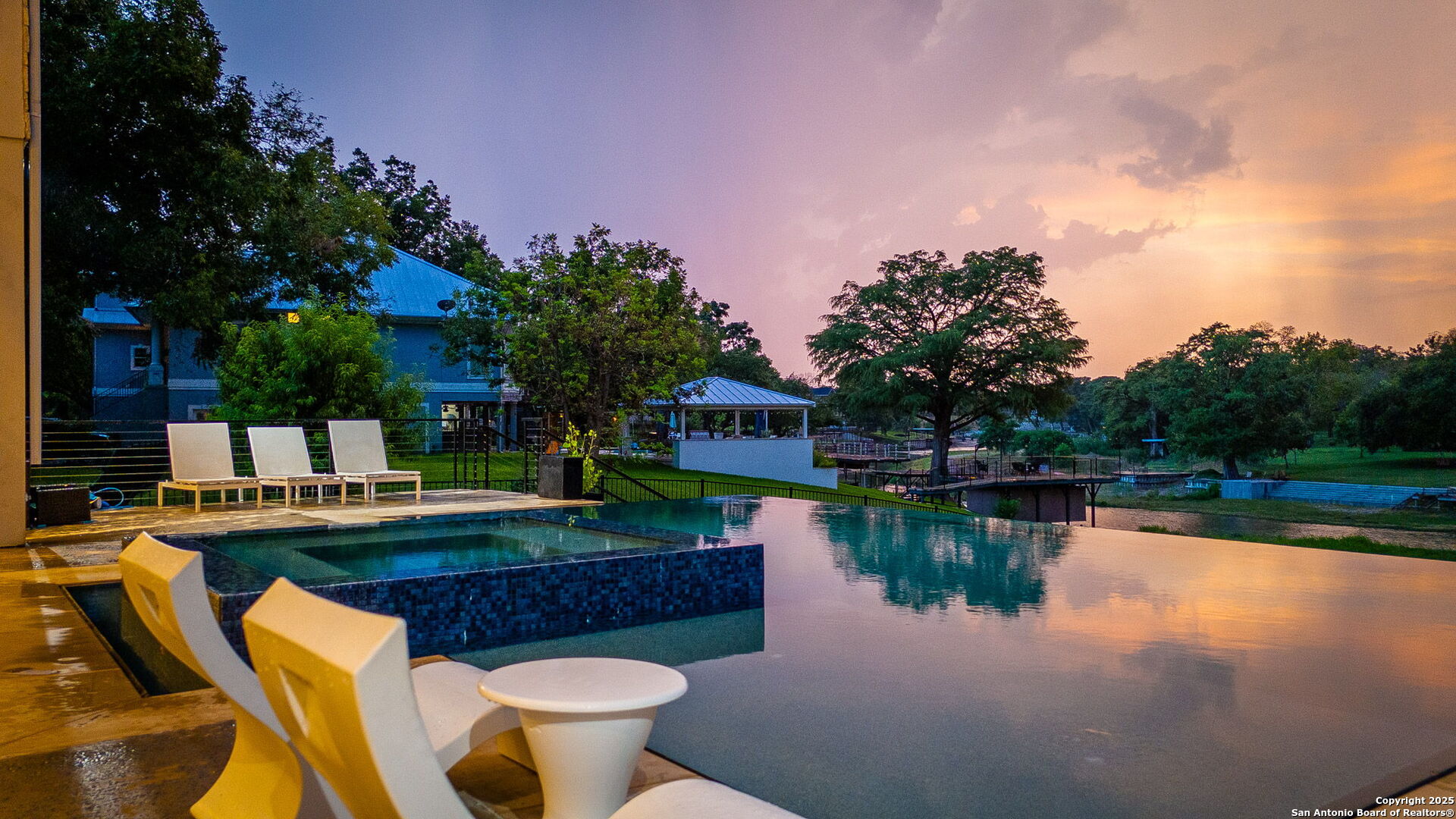 140 Rio Azul Seguin, TX 78155 - Photo 3 of 34 a view of a lake with couches and city view