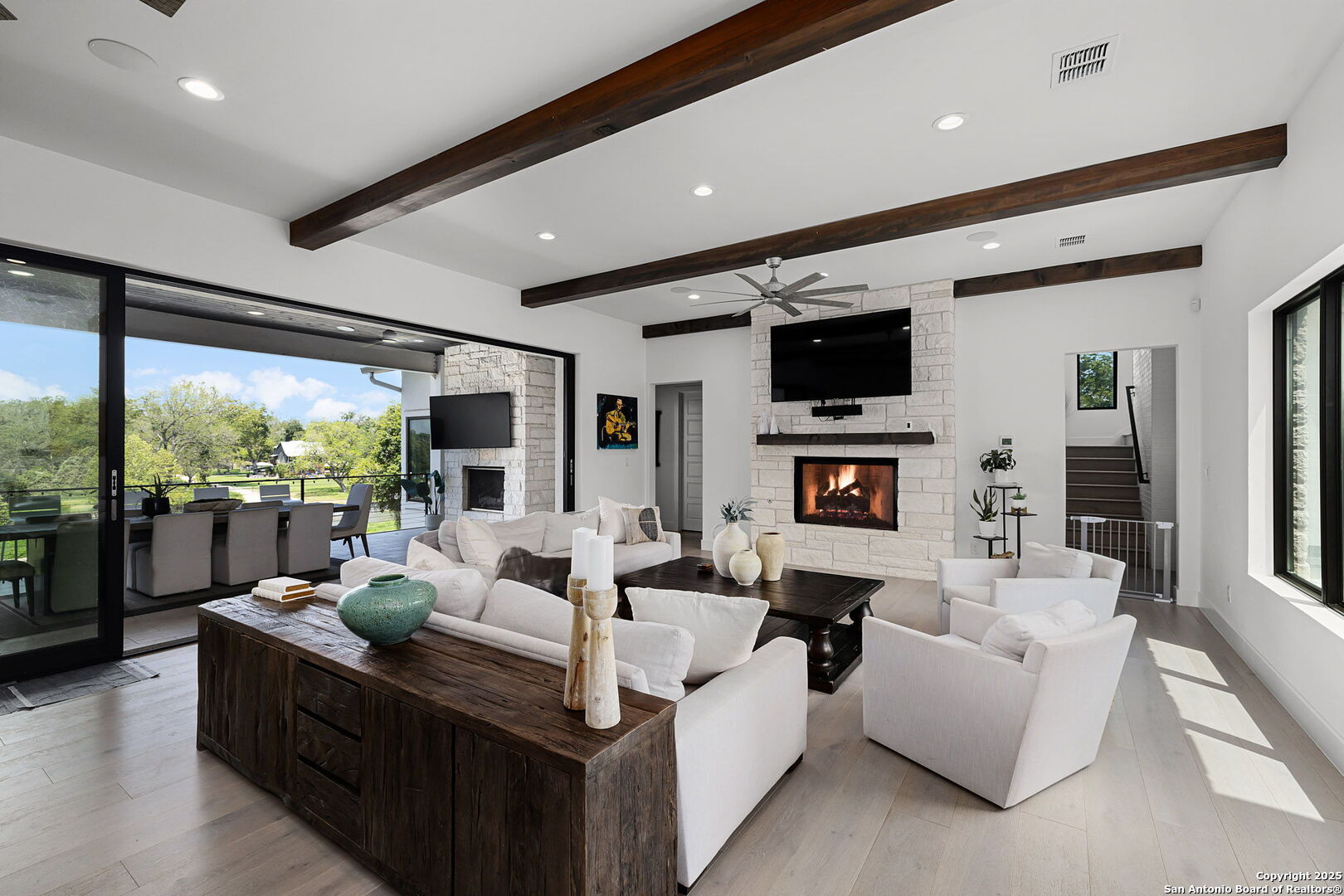 140 Rio Azul Seguin, TX 78155 - Photo 6 of 34 a living room with fireplace furniture and a flat screen tv