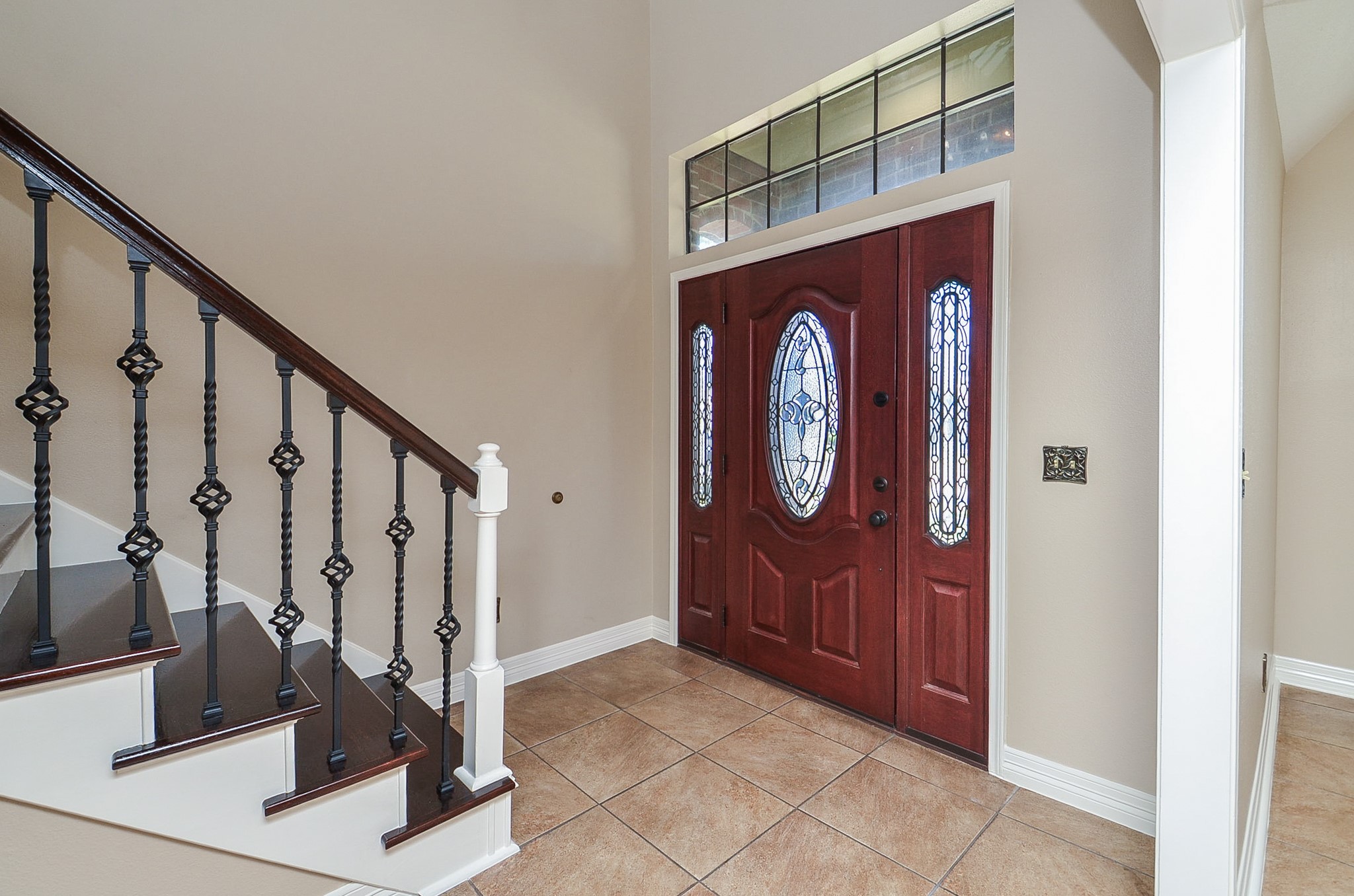 8803 Tweedbrook Drive Spring, TX 77379 - Photo 5 of 36 Step into this impressive, bright two-story foyer that exudes elegance and sophistication!