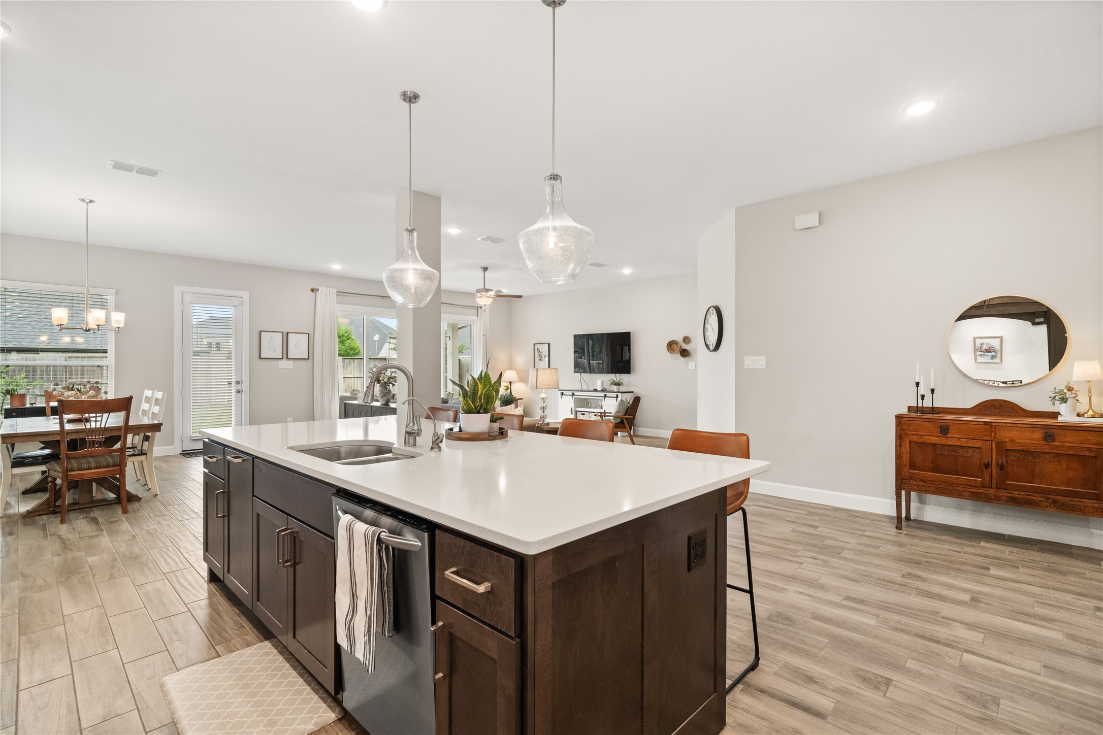3118 Swift Way Katy, TX 77493 - Photo 6 of 34 Kitchen (Cooking Area) – A chef-inspired layout with a gas cooktop, built-in appliances, and generous counter space for effortless meal preparation.