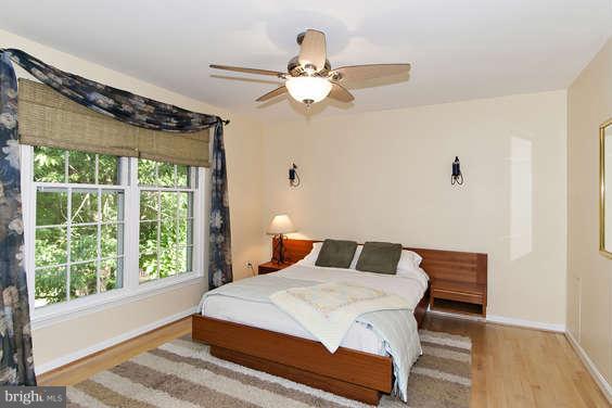 2803 Deer Ridge Drive Silver Spring, MD 20904 - Photo 16 of 30 a bedroom with a bed and a window