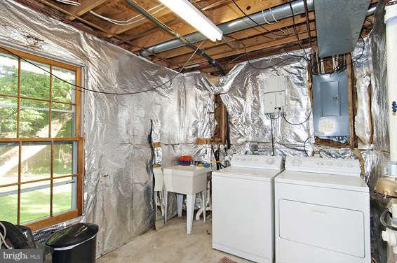 2803 Deer Ridge Drive Silver Spring, MD 20904 - Photo 27 of 30 a utility room with dryer and washer