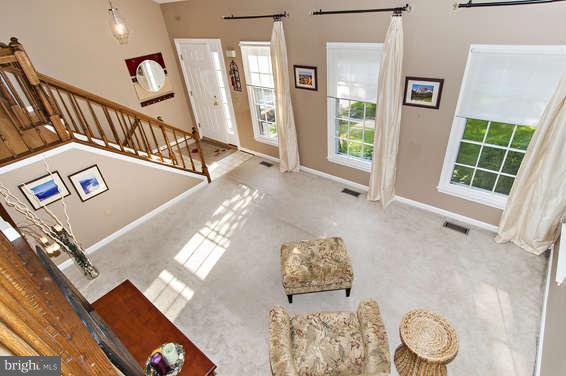 2803 Deer Ridge Drive Silver Spring, MD 20904 - Photo 7 of 30 a view of entryway and hall with wooden floor
