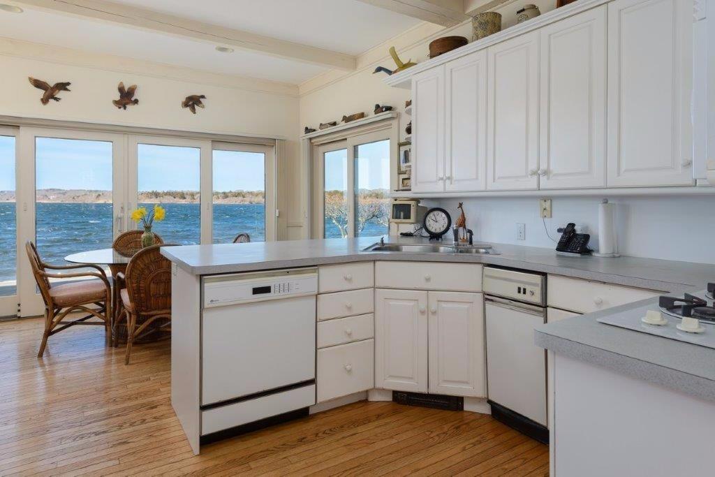 333 Mill Road Falmouth, MA 02540 - Photo 12 of 28 a kitchen with cabinets a sink and appliances