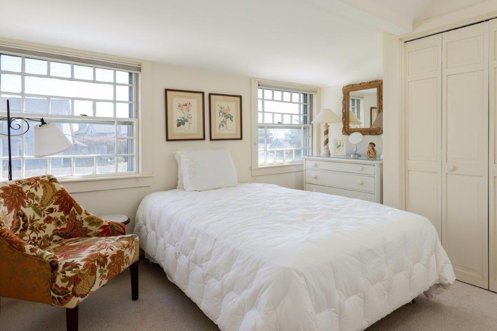 333 Mill Road Falmouth, MA 02540 - Photo 18 of 28 a bedroom with a large bed and a window