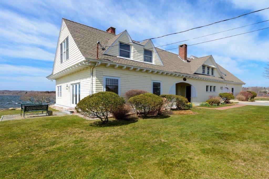 333 Mill Road Falmouth, MA 02540 - Photo 2 of 28 a front view of a house with garden