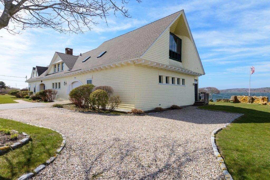 333 Mill Road Falmouth, MA 02540 - Photo 3 of 28 a front view of a house with a yard