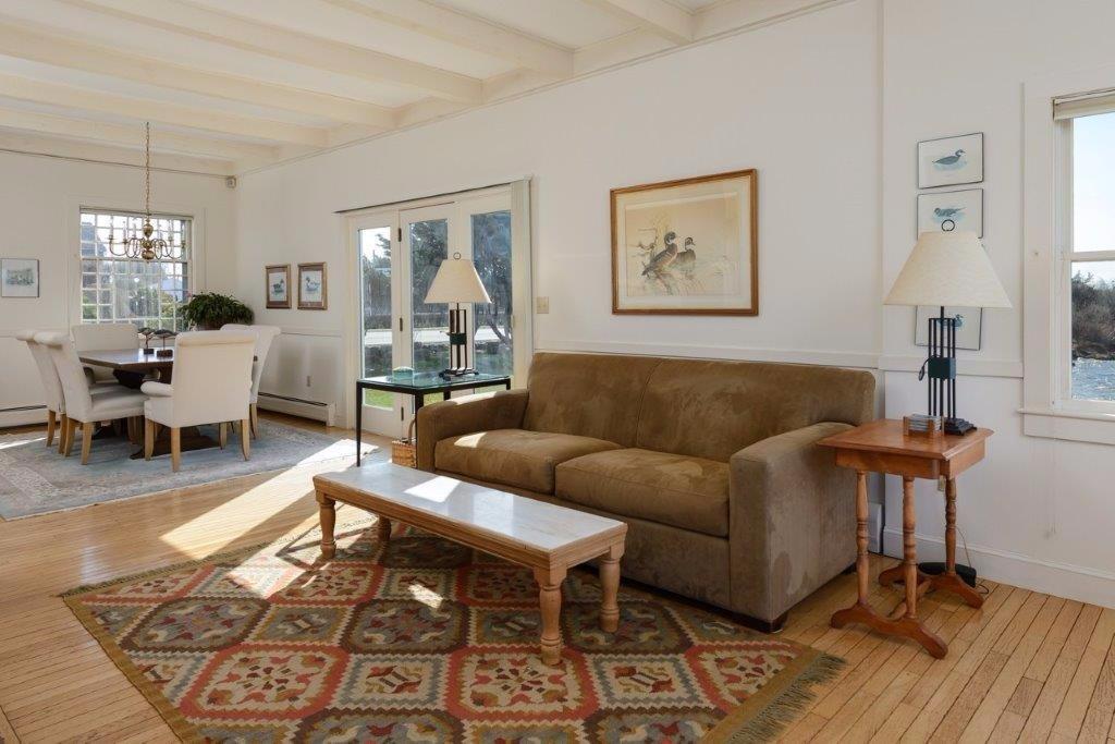 333 Mill Road Falmouth, MA 02540 - Photo 10 of 28 a living room with furniture and wooden floor