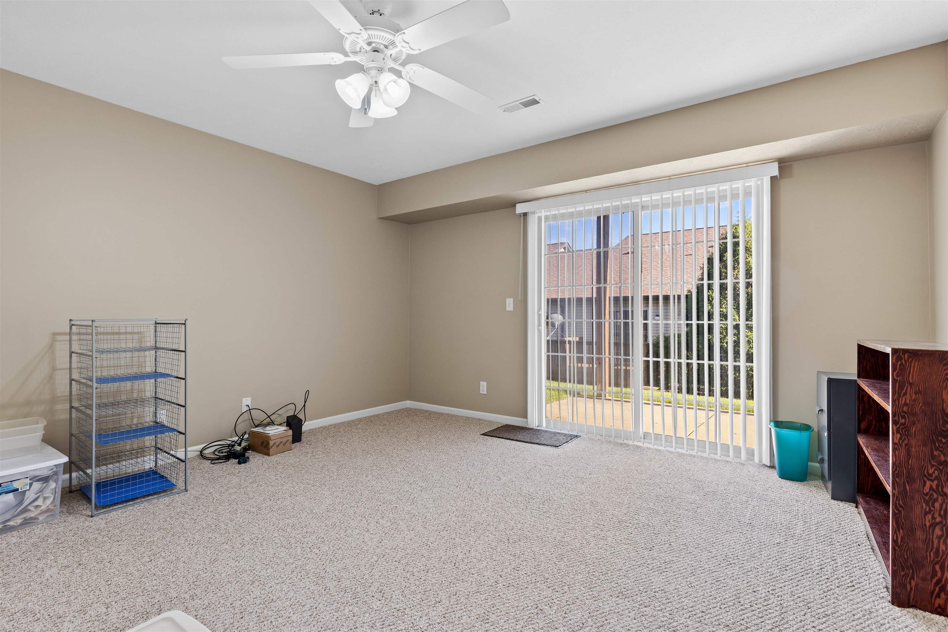 4841 Snowcap Run Loves Park, IL 61111 - Photo 12 of 18 a view of an empty room with a window