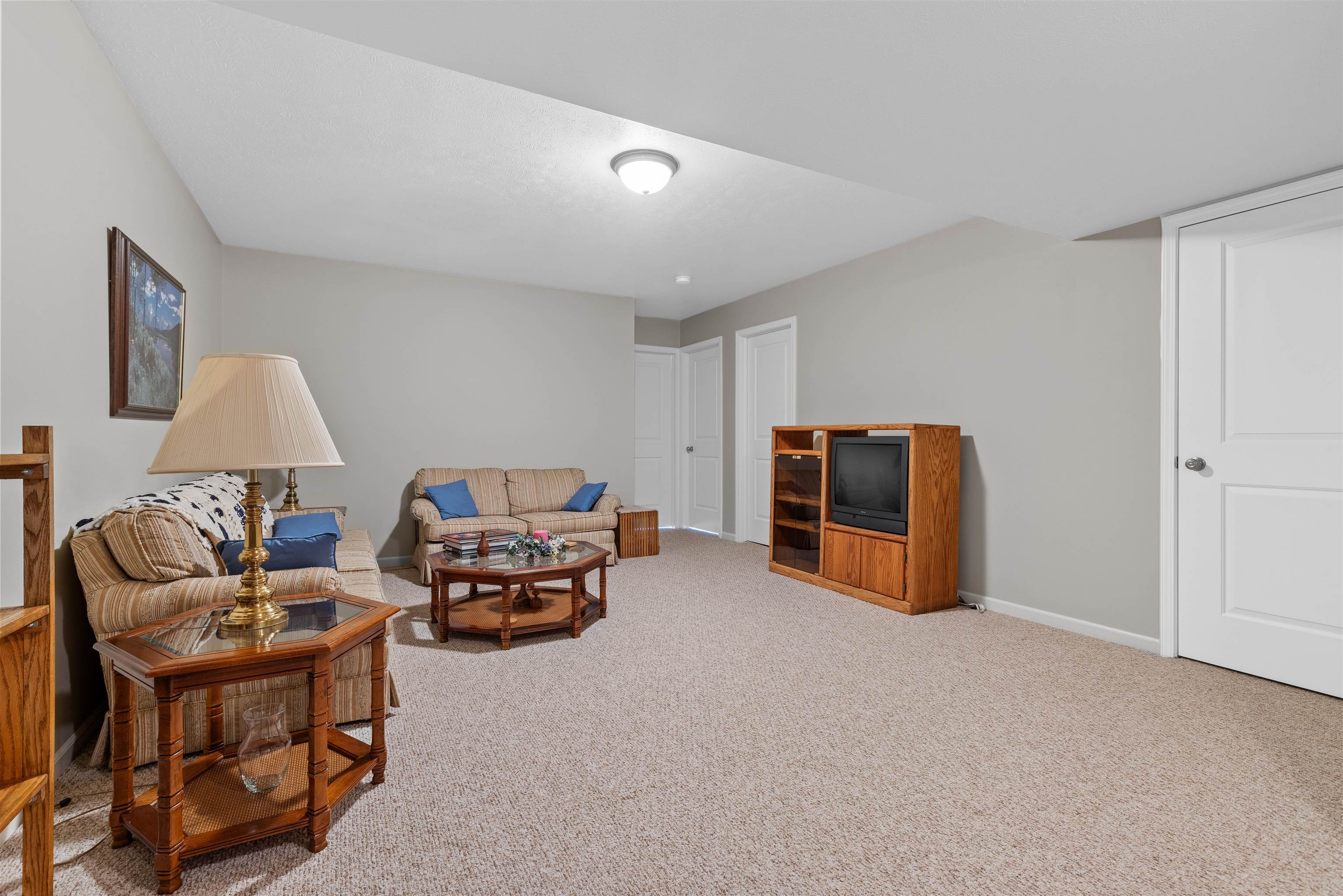 4841 Snowcap Run Loves Park, IL 61111 - Photo 14 of 18 a living room with furniture and a lamp