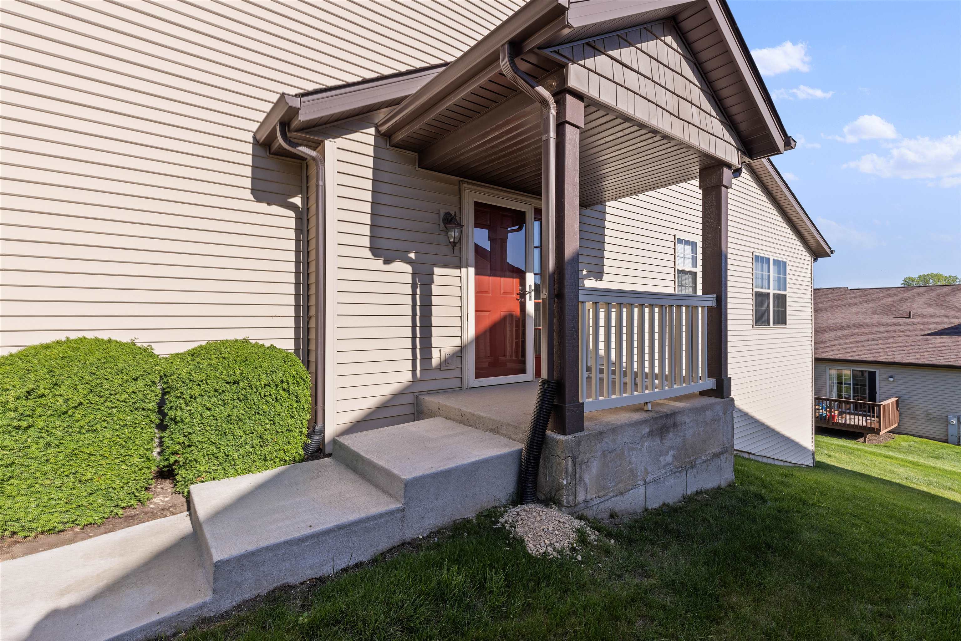 4841 Snowcap Run Loves Park, IL 61111 - Photo 2 of 18 a front view of a house with garden