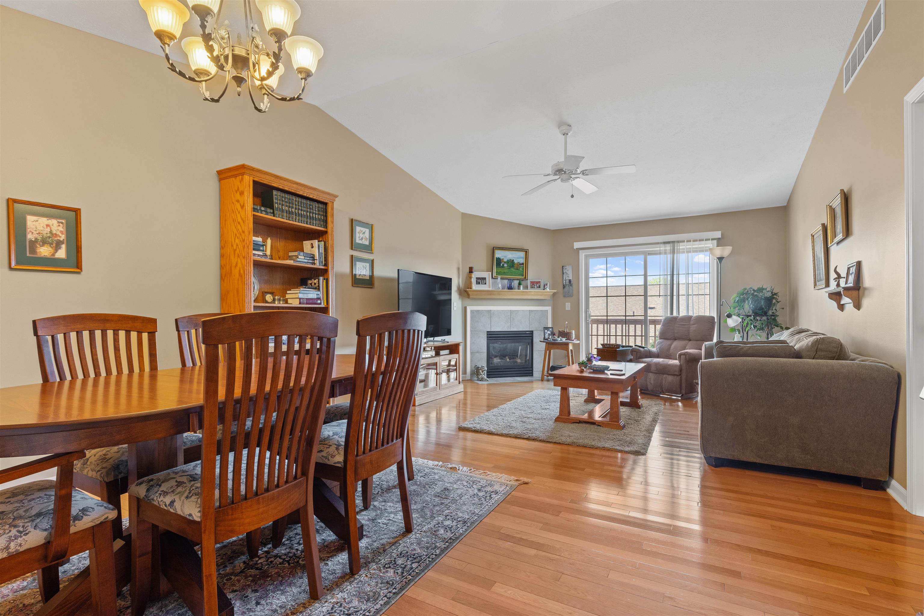 4841 Snowcap Run Loves Park, IL 61111 - Photo 4 of 18 a living room with fireplace furniture and a window