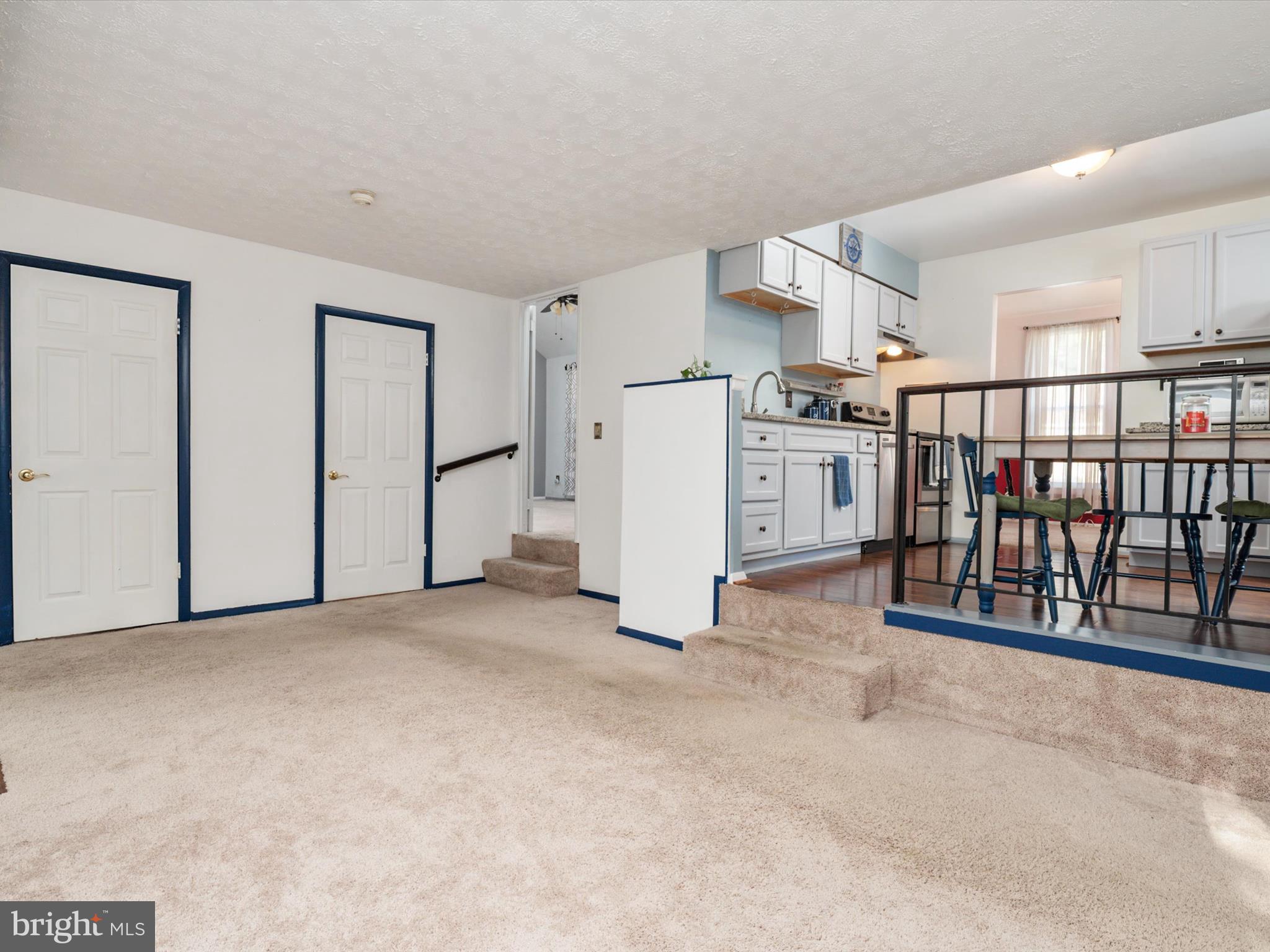 4333 Declaration Circle Belcamp, MD 21017 - Photo 18 of 37 a view of a kitchen with refrigerator and white cabinets