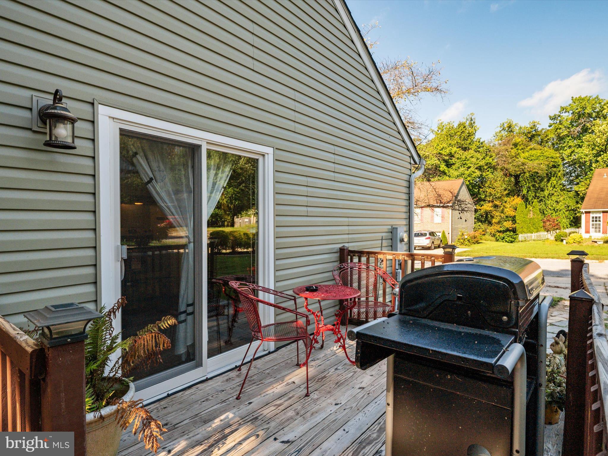4333 Declaration Circle Belcamp, MD 21017 - Photo 29 of 37 a view of a patio with table and chairs and a barbeque