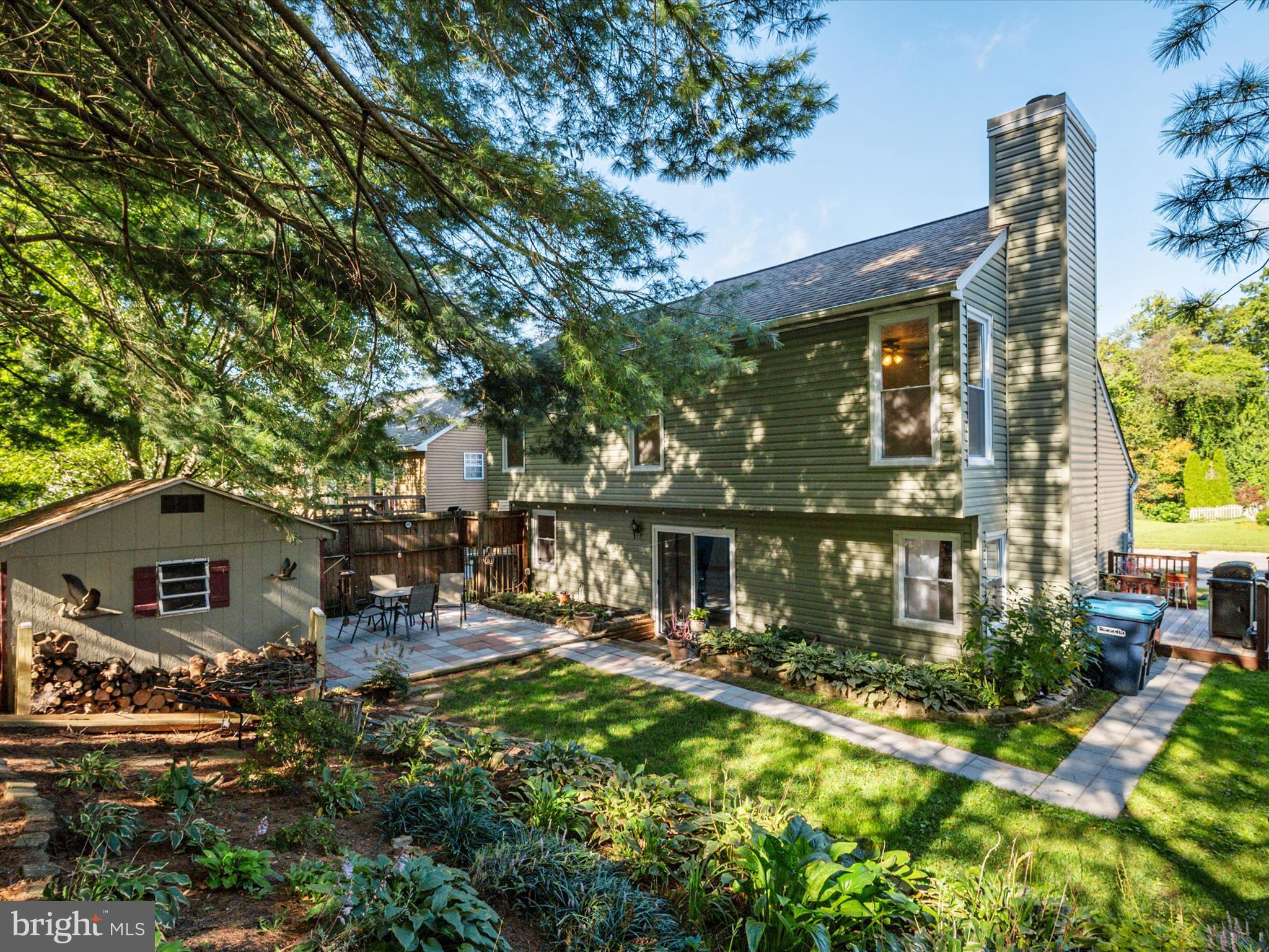4333 Declaration Circle Belcamp, MD 21017 - Photo 32 of 37 a front view of a house with a yard table and chairs