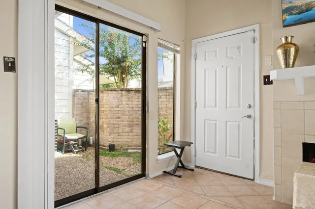 a view of a bathroom with a tub and shower