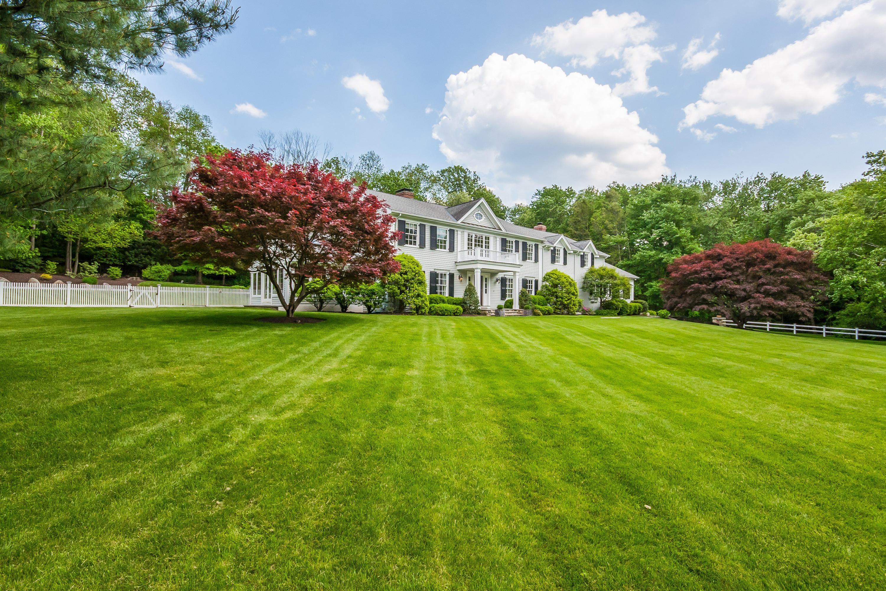 388 Middlesex Road Darien, CT 06820 - Photo 4 of 41 a view of house with backyard