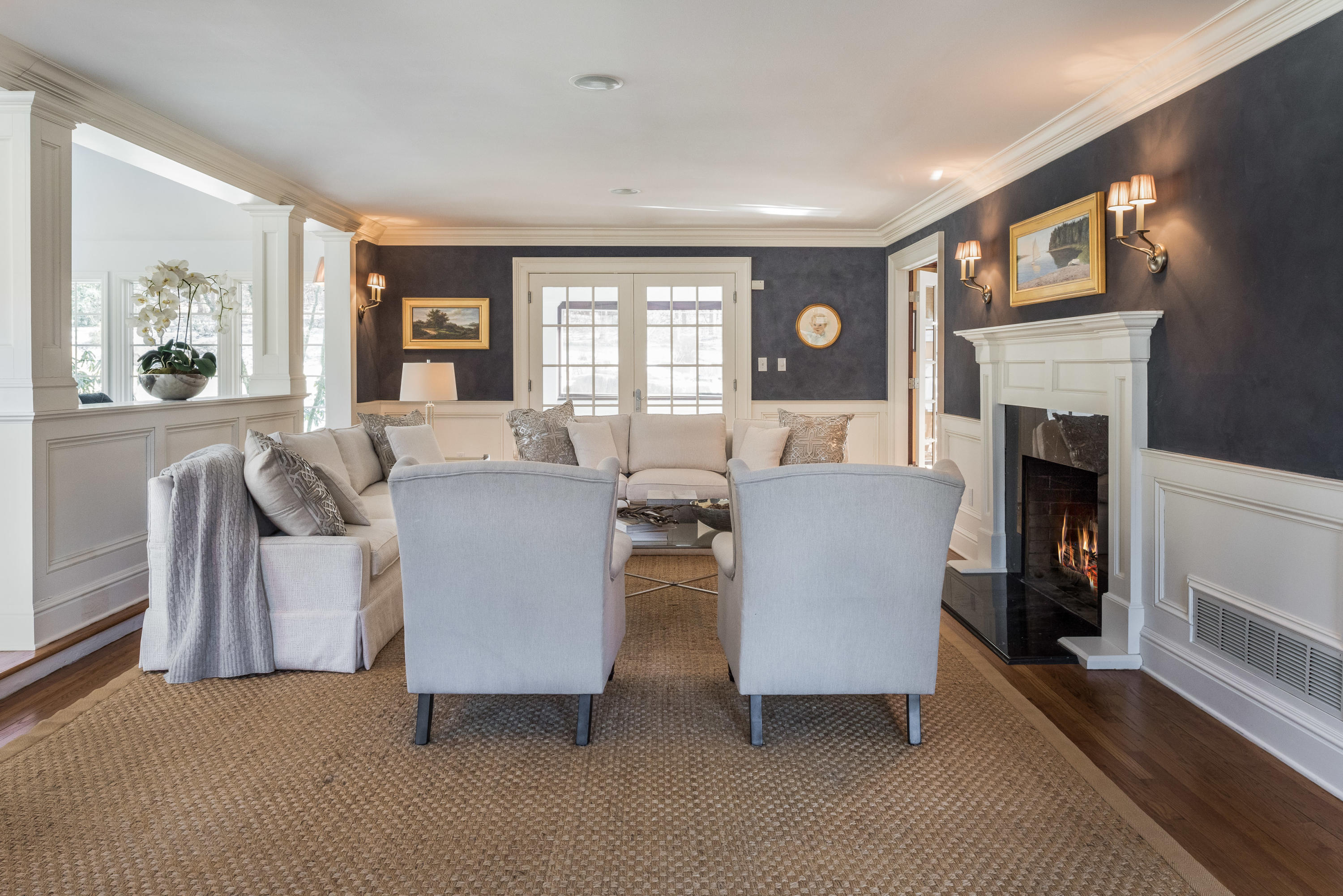 388 Middlesex Road Darien, CT 06820 - Photo 8 of 41 a living room with fireplace furniture and a large window