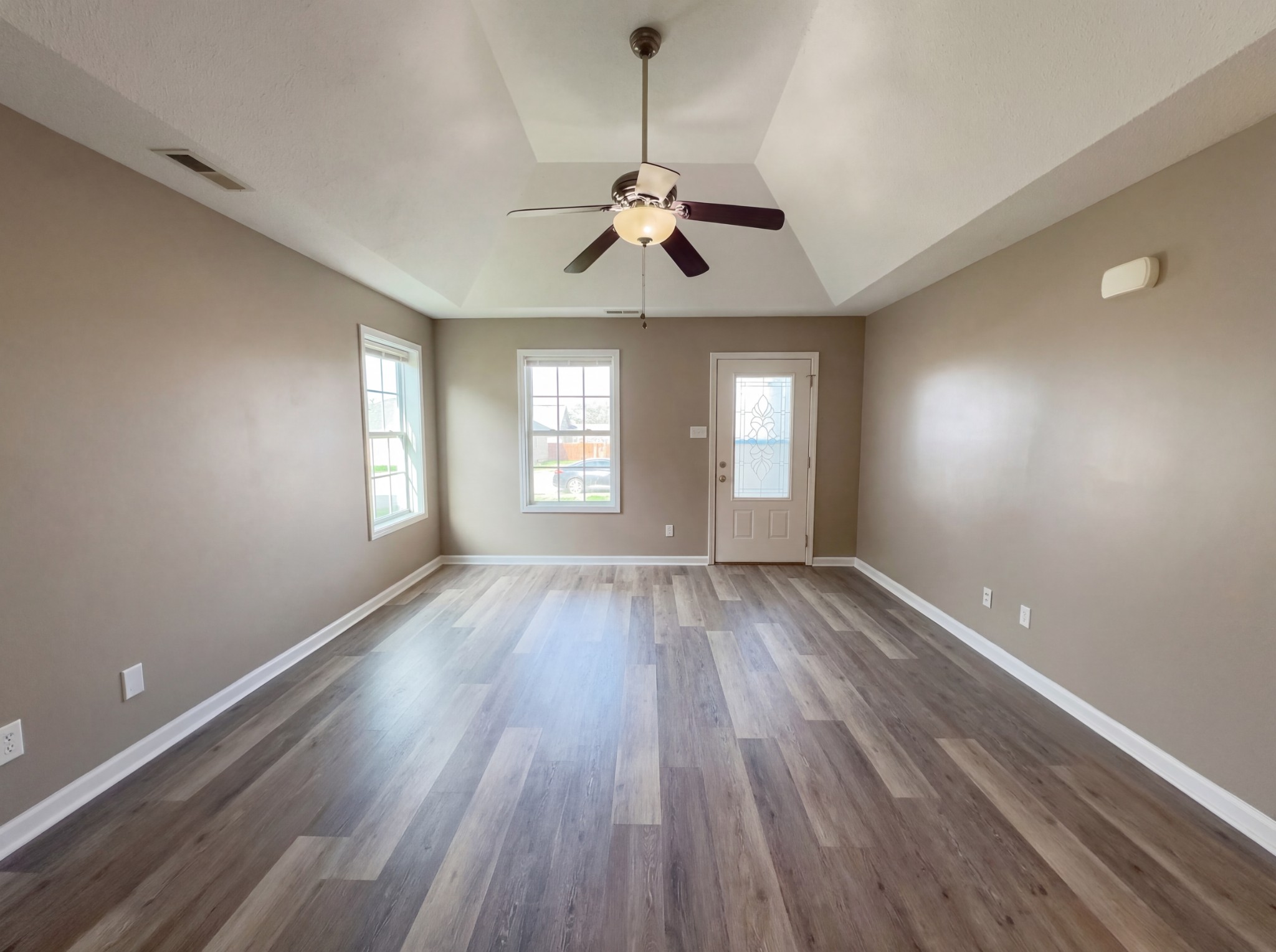 511 Bridle Way Hopkinsville, KY 42240 - Photo 3 of 17 a view of empty room with wooden floor and fan