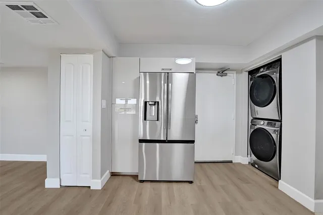 a view of front door and deck of the house