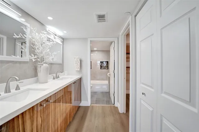 a lobby with furniture and floor to ceiling window