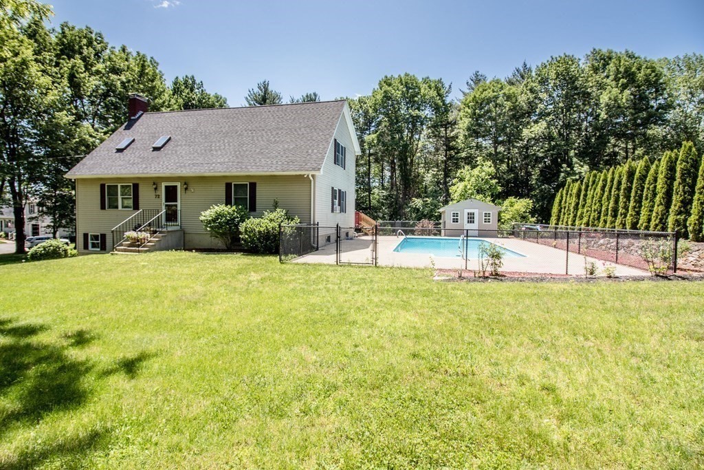 72 Bond Road Charlton, MA 01507 - Photo 1 of 36 a view of a house with backyard and sitting area