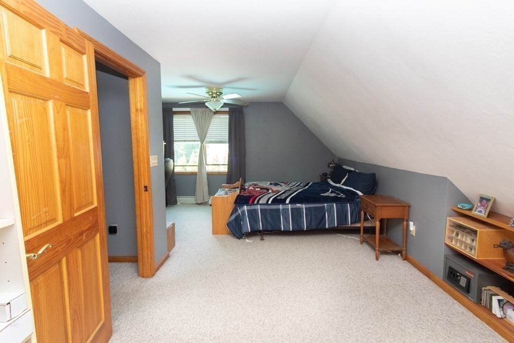 72 Bond Road Charlton, MA 01507 - Photo 15 of 36 a bedroom with furniture and a window