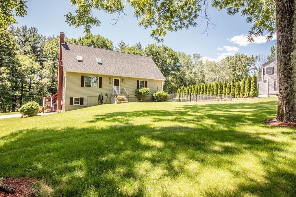 72 Bond Road Charlton, MA 01507 - Photo 2 of 36 a front view of house with yard and green space