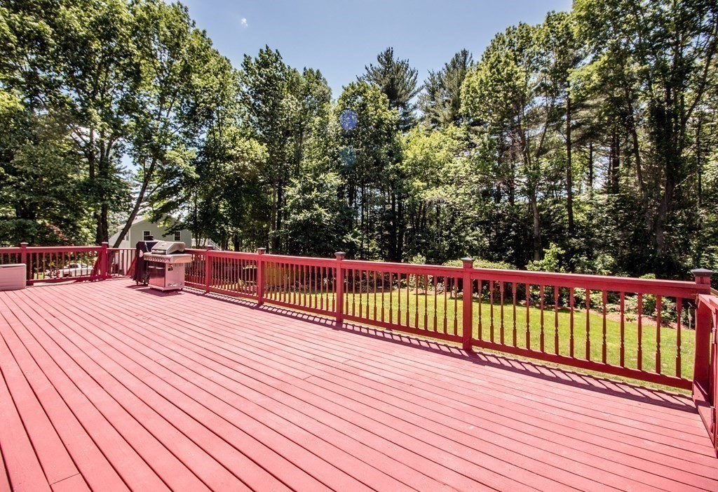 72 Bond Road Charlton, MA 01507 - Photo 26 of 36 a view of a balcony with wooden floor and fence