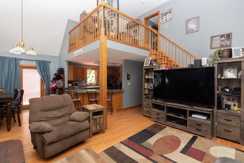 72 Bond Road Charlton, MA 01507 - Photo 7 of 36 a living room with furniture and a flat screen tv