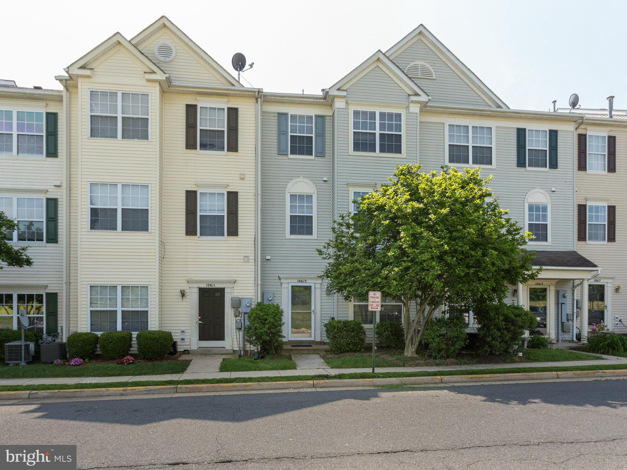 10613 Lockerbie Way Manassas, VA 20109 - Photo 1 of 27 a front view of a residential houses