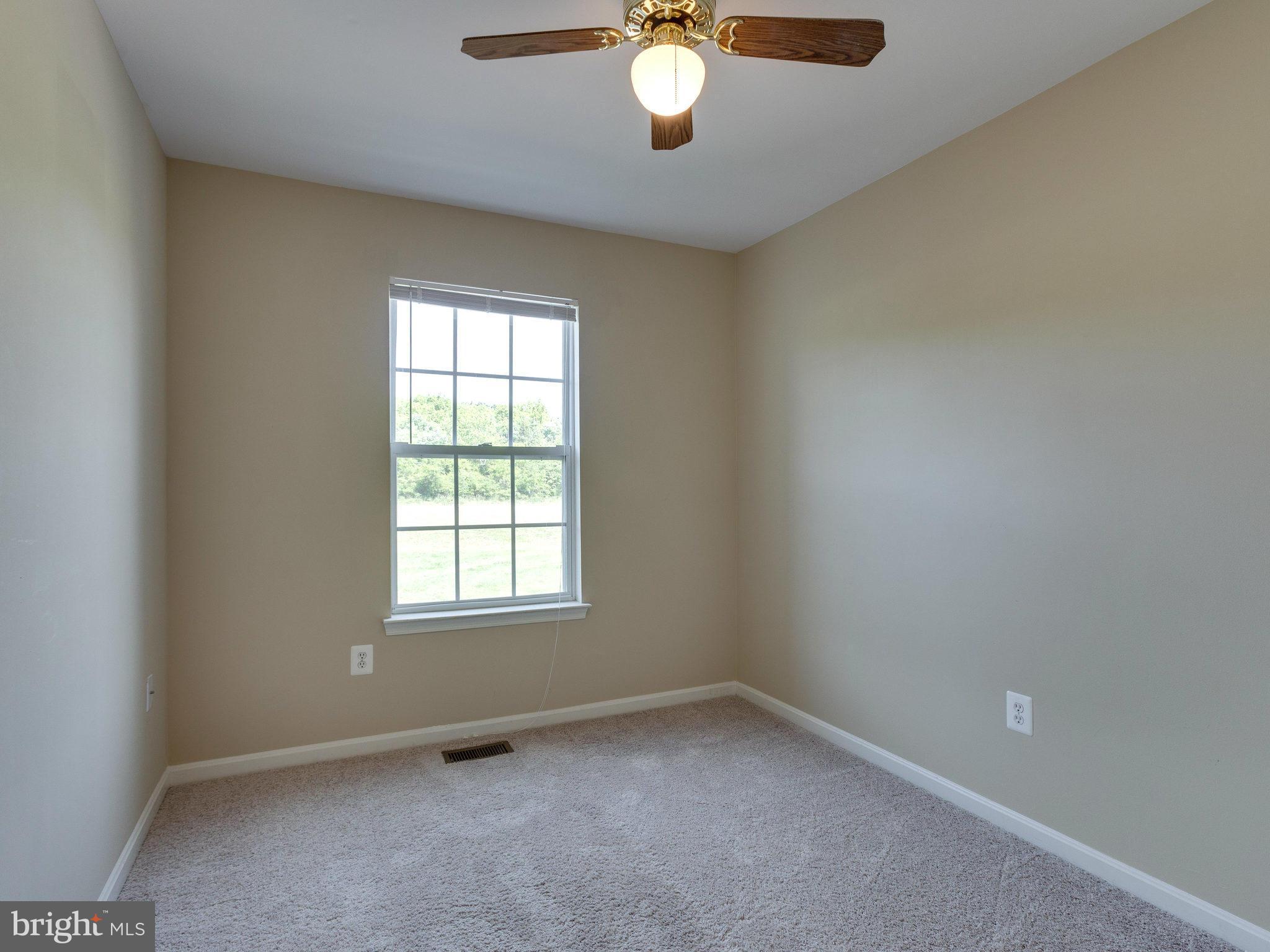 10613 Lockerbie Way Manassas, VA 20109 - Photo 16 of 27 an empty room with a window