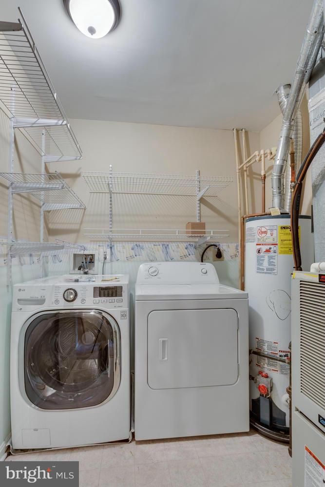 10613 Lockerbie Way Manassas, VA 20109 - Photo 18 of 27 a utility room with dryer and washer