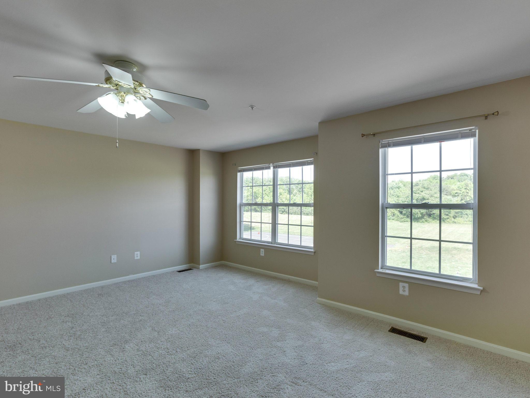 10613 Lockerbie Way Manassas, VA 20109 - Photo 19 of 27 a view of an empty room with a window