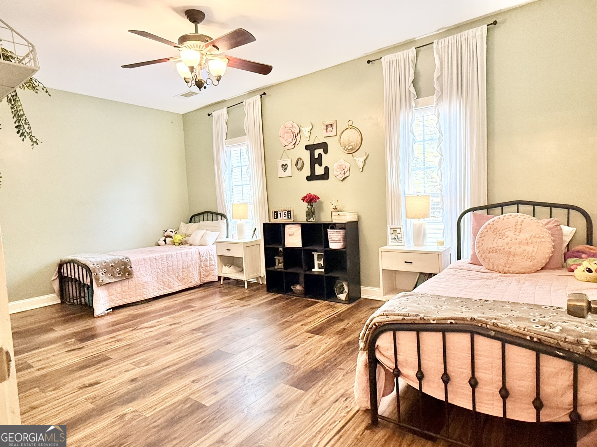 919 West Milner Road Concord, GA 30206 - Photo 24 of 40 a bedroom with a bed and wooden floor