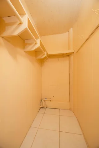 a bathroom with a shower and a toilet