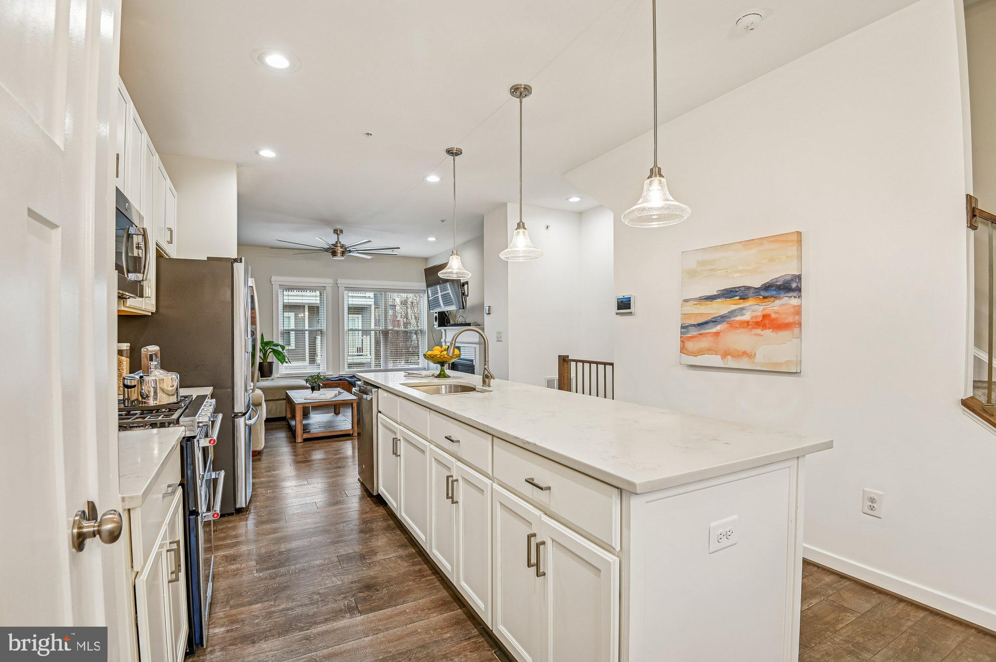123 Lejeune Way Annapolis, MD 21401 - Photo 14 of 43 a large white kitchen with lots of counter space