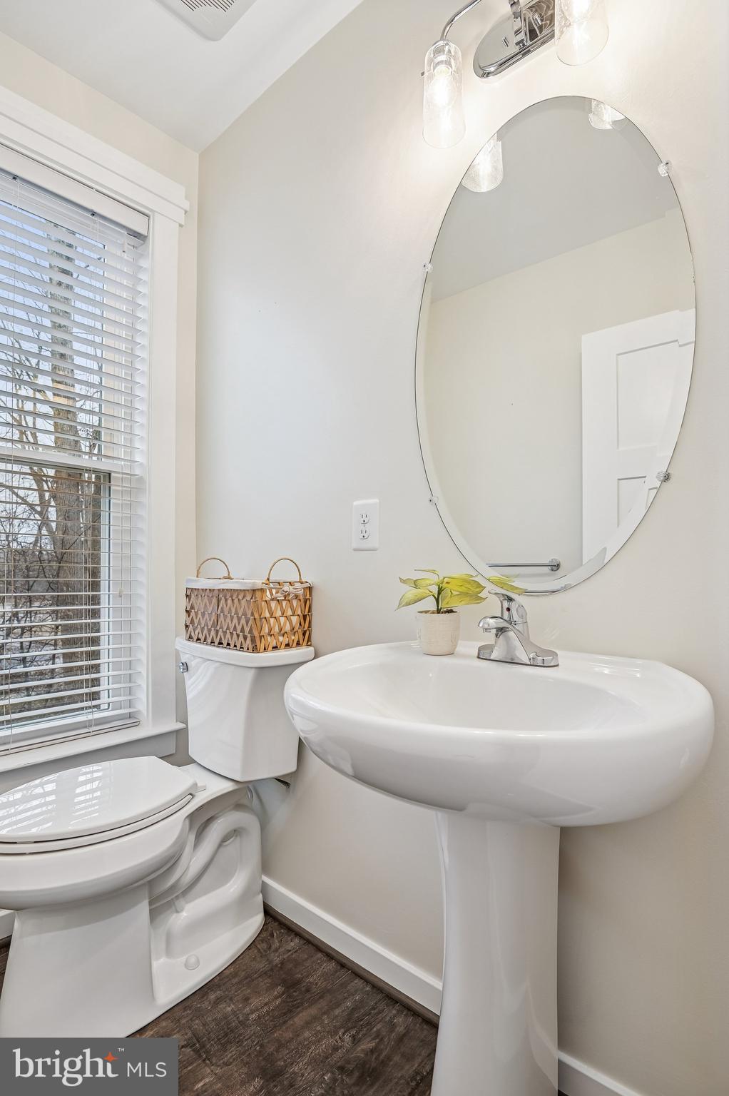 123 Lejeune Way Annapolis, MD 21401 - Photo 17 of 43 a bathroom with a sink toilet and mirror
