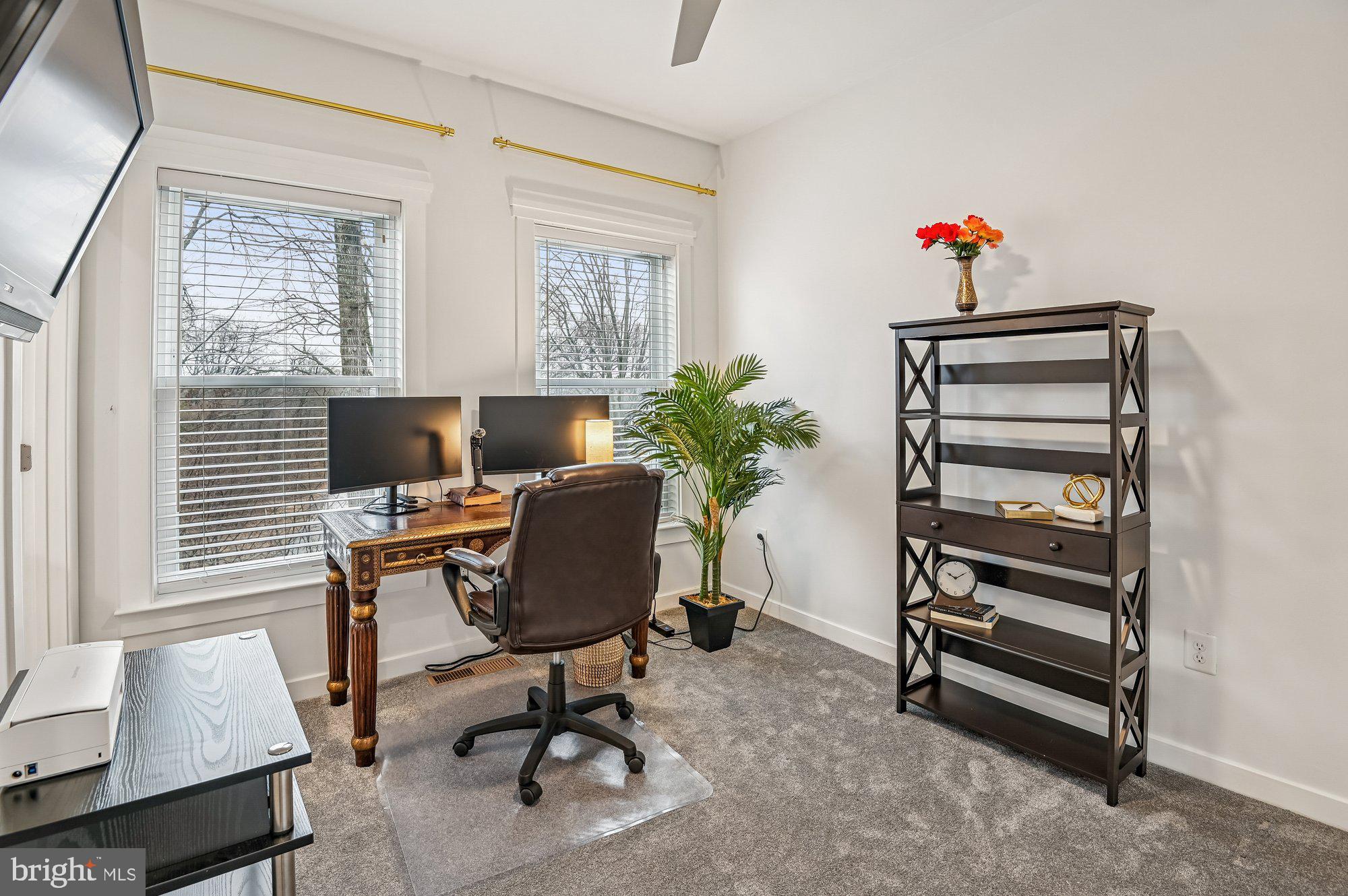 123 Lejeune Way Annapolis, MD 21401 - Photo 24 of 43 a view of a workspace with furniture and a window
