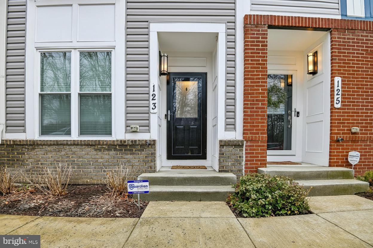 123 Lejeune Way Annapolis, MD 21401 - Photo 5 of 43 a view of a brick house with large windows