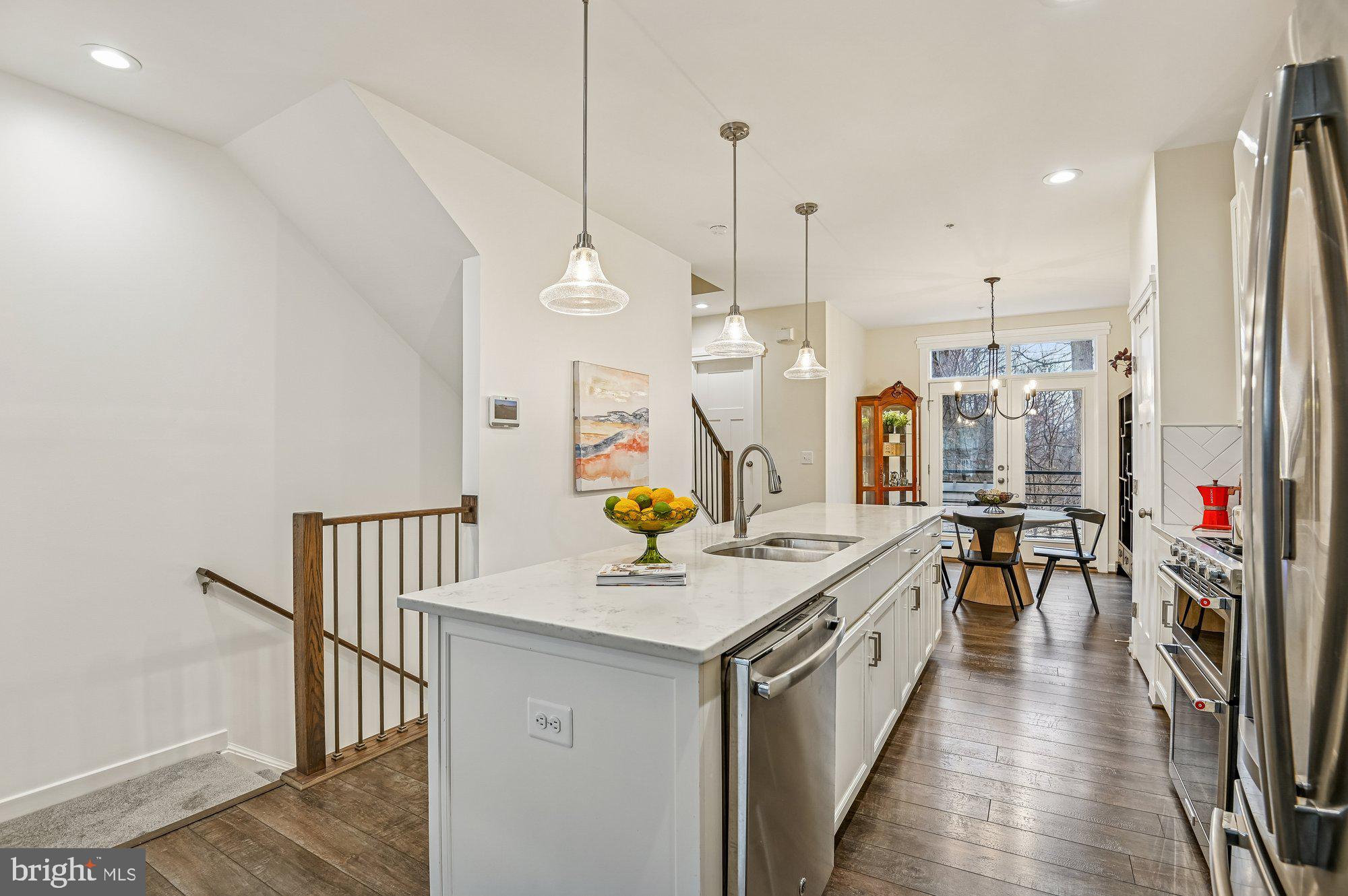 123 Lejeune Way Annapolis, MD 21401 - Photo 10 of 43 a kitchen that has a lot of table and chairs