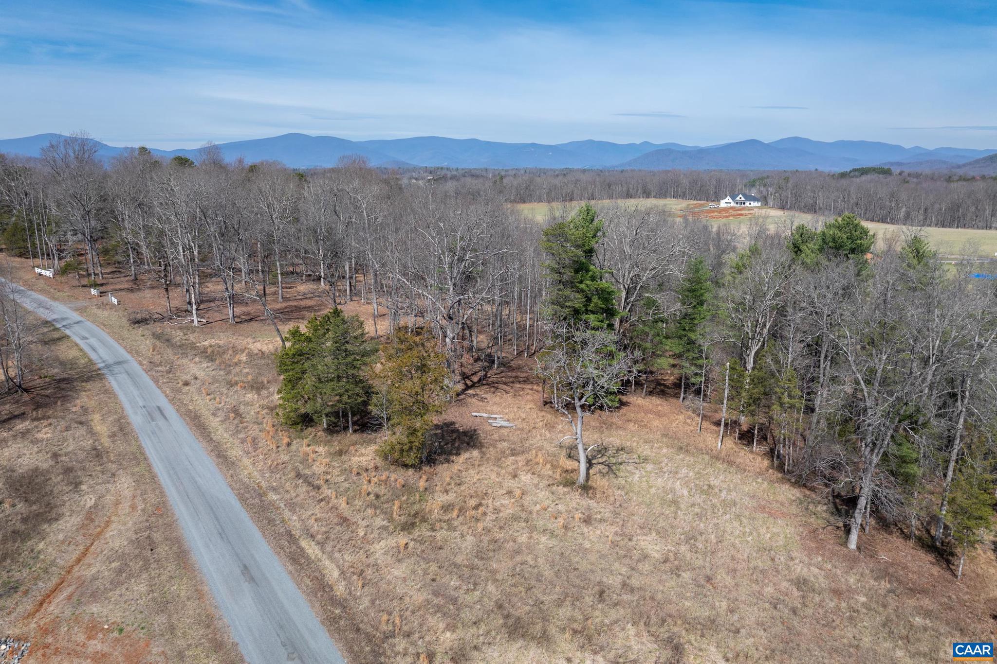 0 Narrows Way, Unit 15 Ruckersville, VA 22968 - Photo 12 of 24 a view of a lake with a mountain