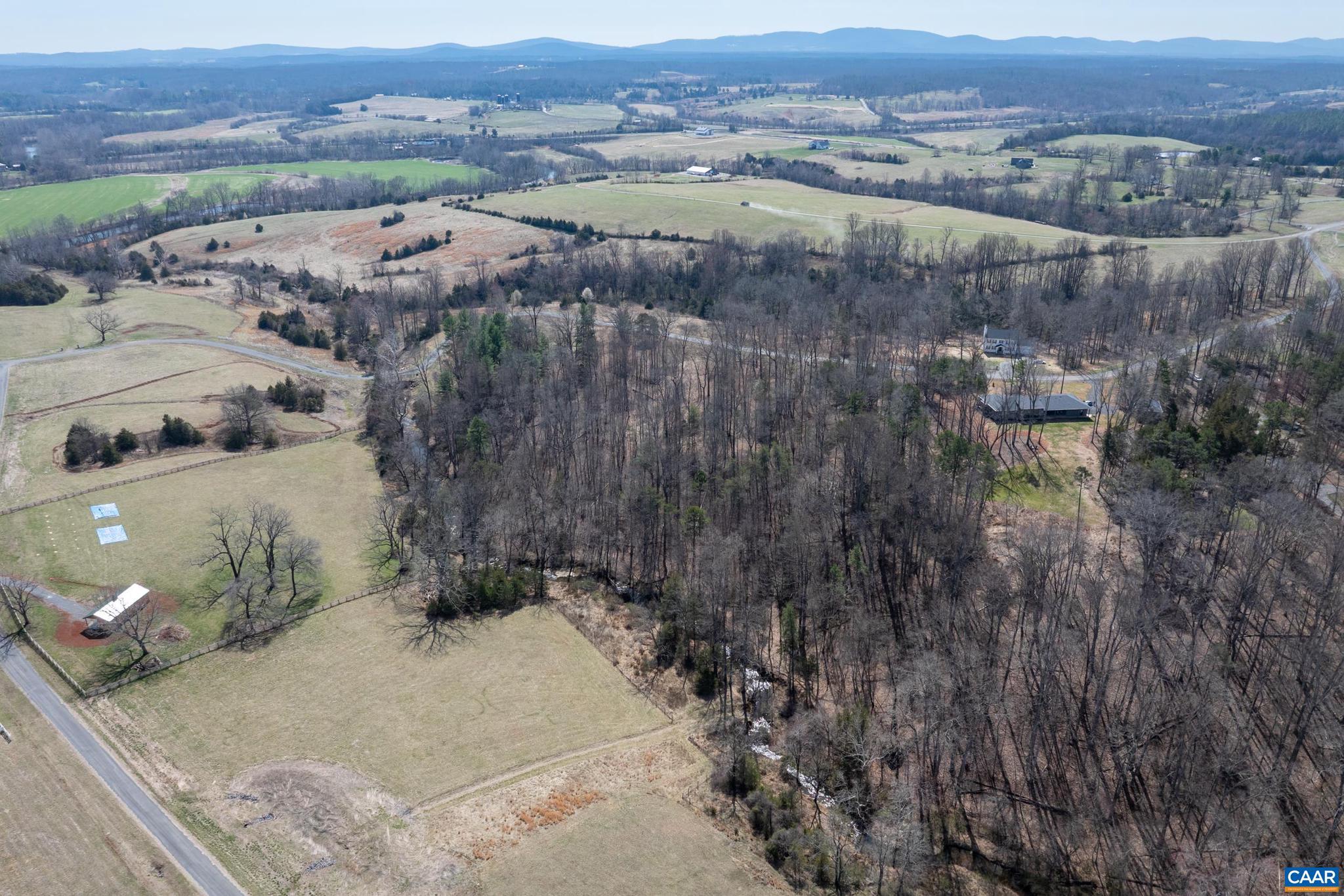 0 Narrows Way, Unit 15 Ruckersville, VA 22968 - Photo 23 of 24 an aerial view of a house with a yard