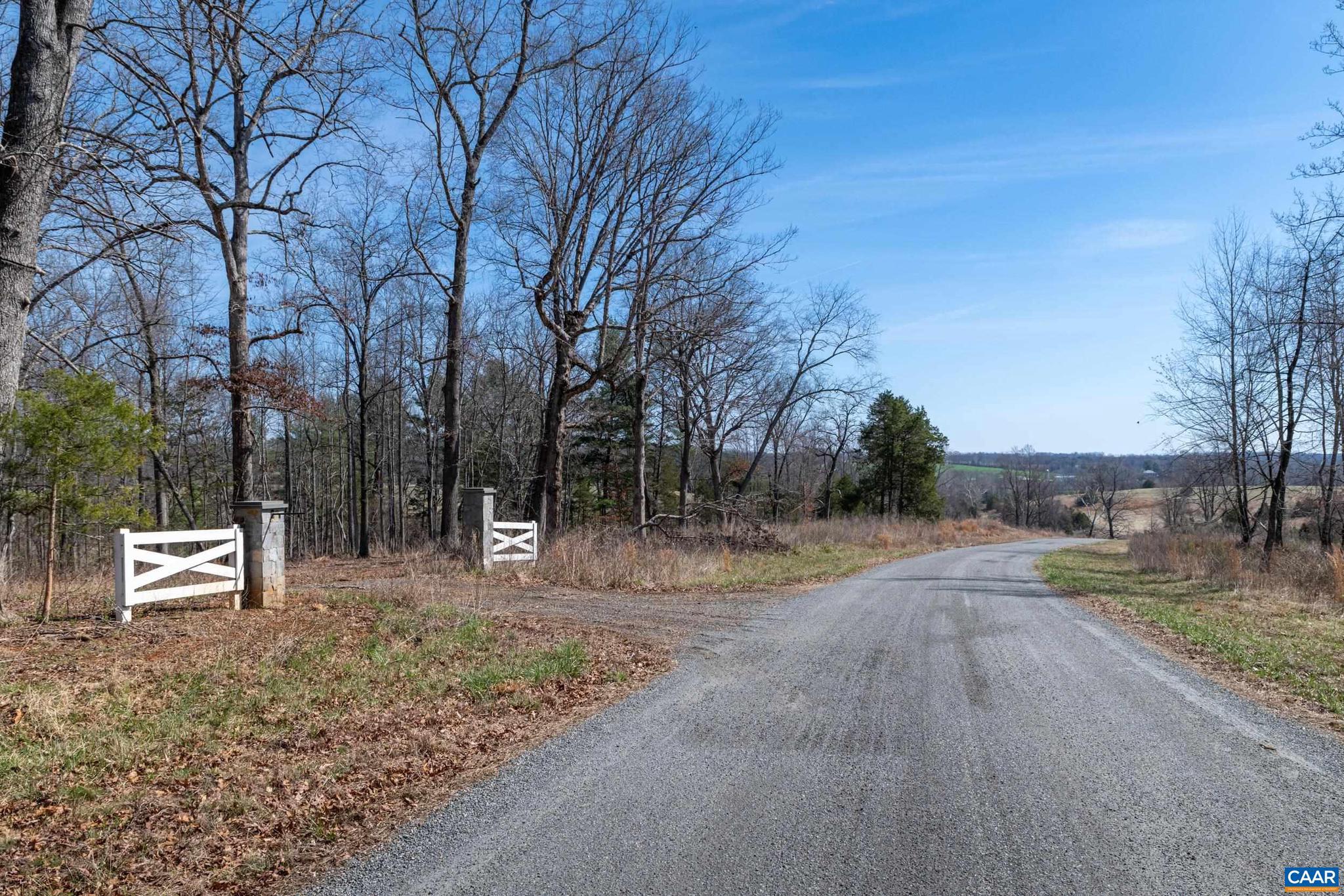0 Narrows Way, Unit 15 Ruckersville, VA 22968 - Photo 10 of 24 a backyard of a house with lots of green space